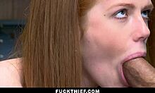 Redheaded shoplifter gets her pussy pounded in home video