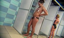 Damn, hot amateur brunette flaunts body in showers!