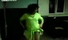 MILF strips and dances in a thong while filming herself