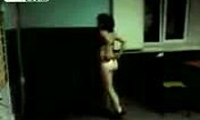 MILF strips and dances in a thong while filming herself