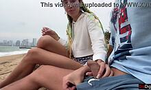 Public beach handjob with cum coverage