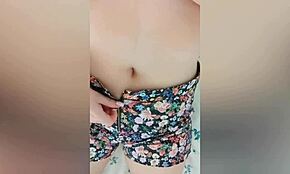 Busty beauty excites nipples while parents sleep