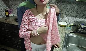 Indian cheating wife caught fucking another man in kitchen. Hindi quickie turns messy.