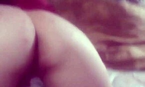 She's giving you a great view while rubbing her pussy at home