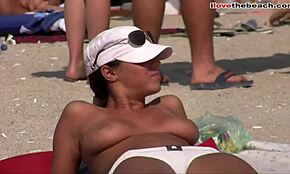 Spying on a Hot Topless Girl Showing Perky Assets on the Nude Beach
