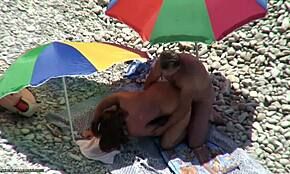 Doggy Style Fucking for Submissive Brunette Chick Caught on Hidden Beach Cam