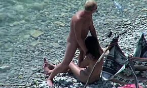 wanna watch this impressive doggy style banging on a rocky beach?