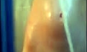 big breasts babe showers and teases in the bathroom