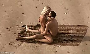 Amateur nudist couple sneaks off for doggy style on beach
