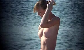 omg i cant believe i caught this perfect breasts blonde naked on beach...