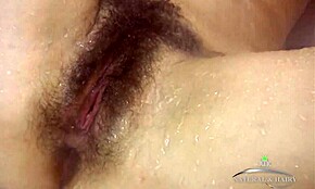 Amateur brunette teen 18+ enjoys a sensual solo shower with fingering