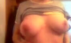 i'm aroused by this sweetie showing magnificent breasts on webcam. she's solo in private homemade scene