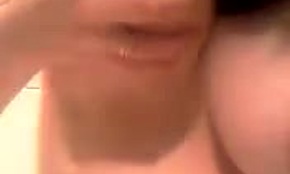 Aroused amateur babe adores playing with her big natural tits