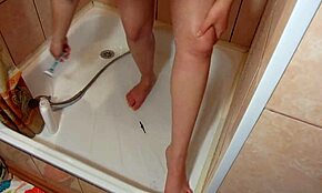 Naked Milf Shaves Hairy Pussy And Legs In Shower