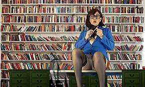 Solitude in the stacks reveals a solo librarian’s secret day. Hidden desires unfold in the quiet dorm.