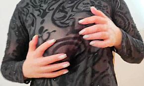 Wearing A Sweatshirt Showing Huge Breasts