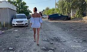 Two Girls Stroll Publicly Without Panties, Flashing Pussies Boldly On The Beach