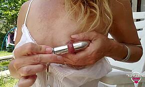 Wow, Nippleringlover stuffs an 18mm vibrator in stretched pierced nipples!
