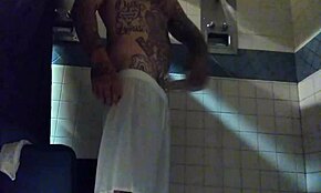 Stroking big tatted white dick in the shower