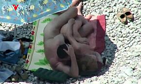 Mature couple caught fucking hard on sunny beach