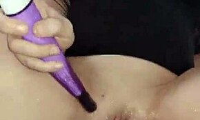 velvet rain masturbates on the edge and squirts with huge toy