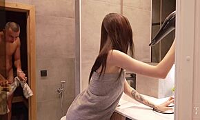 Her sleek Asian body glistened in the sauna. My cock went wild watching her every move.