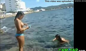 Hey, check these teens with great tits at the beach!