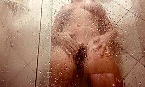 milf films herself washing her hairy pussy in the bathroom