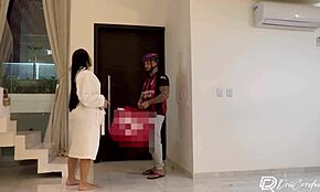 Delivery guy delivers package. He interacts with brunette alone at home.