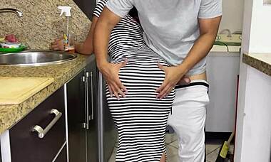 My stunning stepdaughter cleans the kitchen in a tight sexy dress. Her hot big ass keeps drawing my eyes.