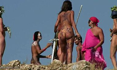 Wow, nudist chicks as warrior goddesses posing on a hill