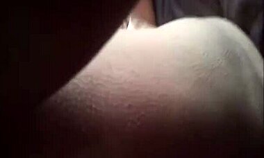 Hey, check this busty blonde wife getting dirty with her man while he's asleep!