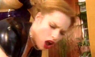 I’m totally blown away by this latex-clad blonde getting fist-fucked by her wild girlfriend in this steamy vid!