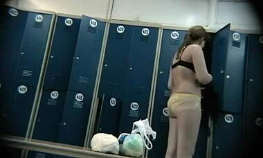 naked sluts trying on swimsuits, showing off hot bodies in changing room