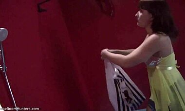 is she stripping in the changing room?