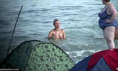 Check out this tanned blonde flaunting her perky ass! 😍