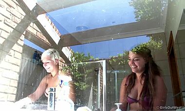 Amateur GFs Magda & Lana chilling in the bathroom with wet posing and striptease