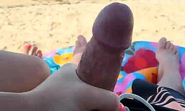 Public Beach Handjob Gets Him Off During Holiday