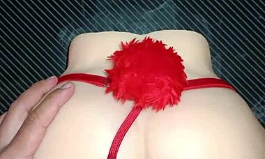Candy's anal sex in sexy red thong with pom-pom drives me wild